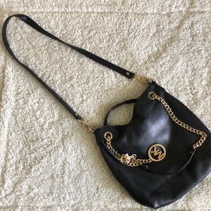 Vintage Michael Kors black leather bag with gold accents